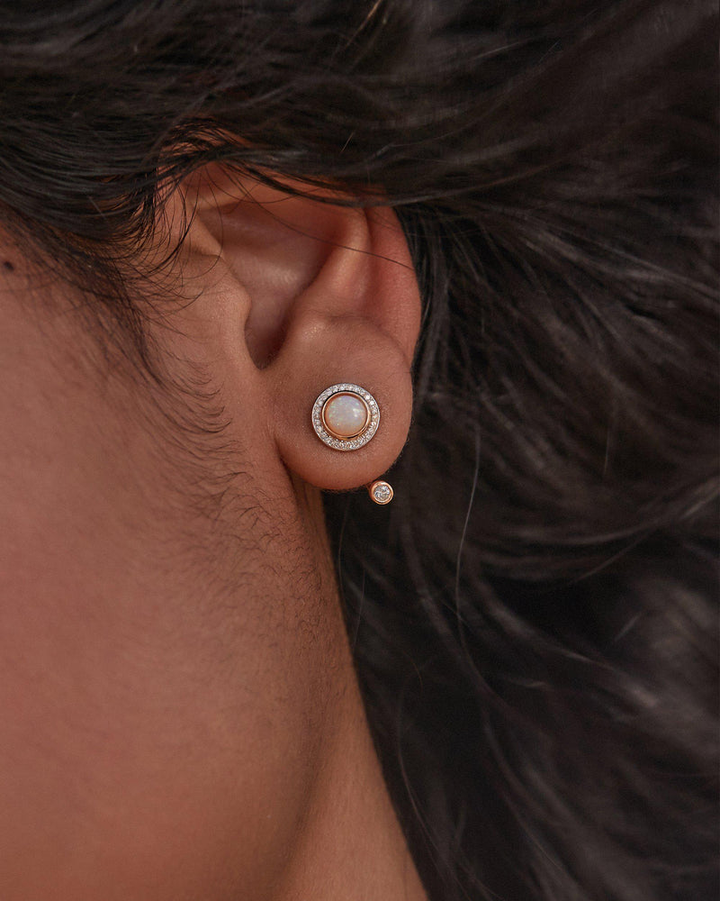 opal gravitation earrings on the model